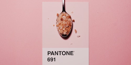 Pink pantone swatch with pink rock salt